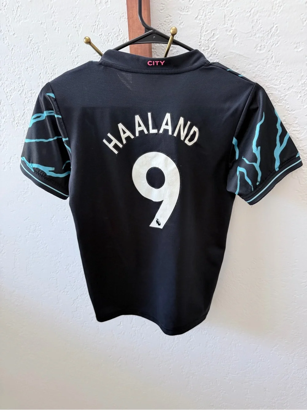 Kids Black Soccer Jersey with Light Blue Accents - Haaland 9
